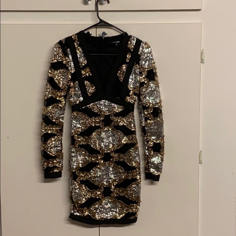 Black and gold sequin dress